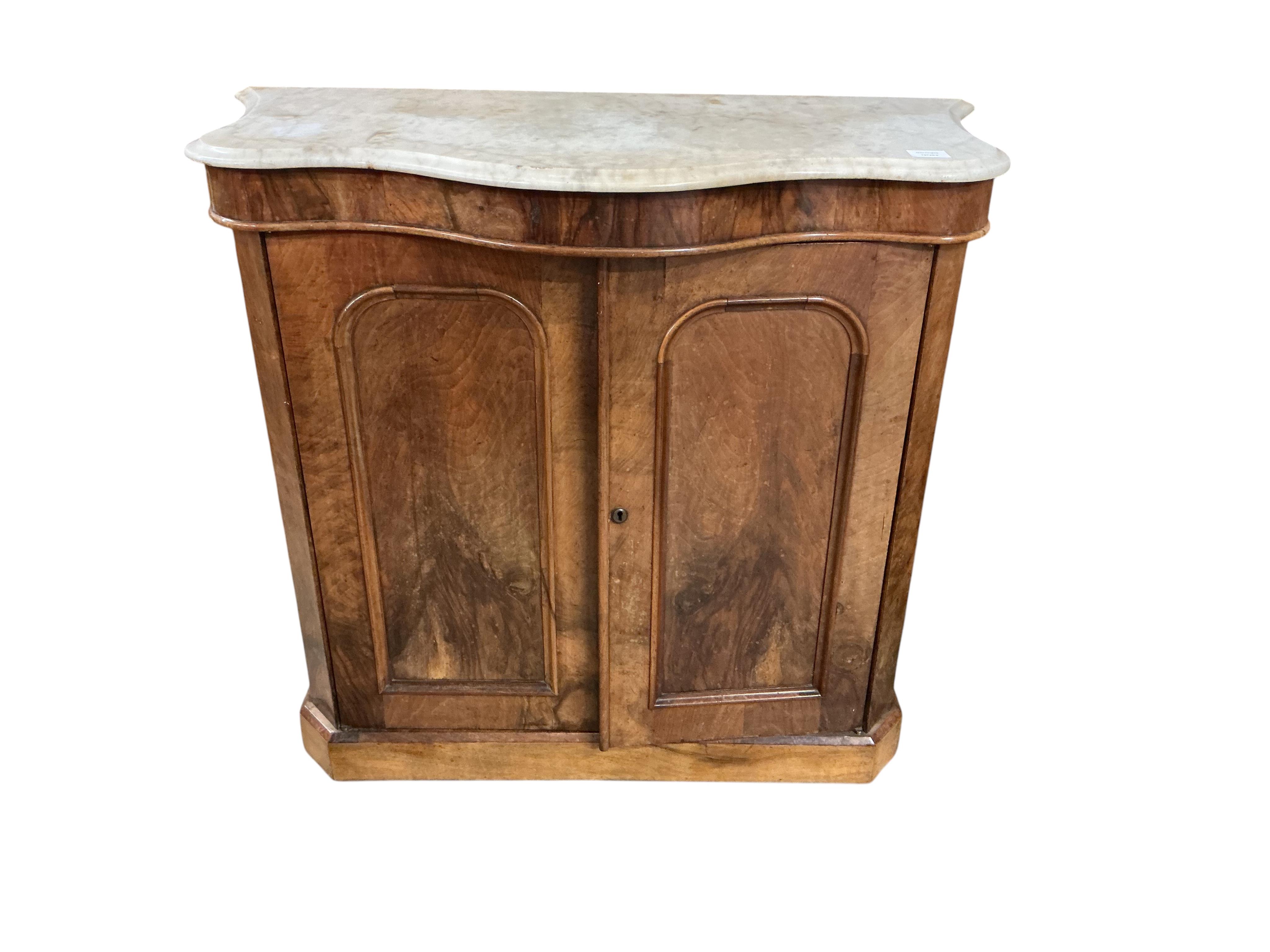 A Victorian walnut serpentine front marble top side cabinet, width 99cm, depth 46cm, height 87cm